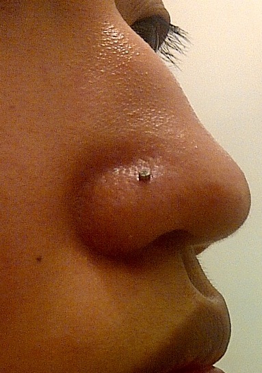 Nostril piercing side view