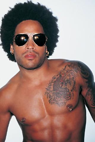 Lenny Kravitz's nipple and nostril piercings on show