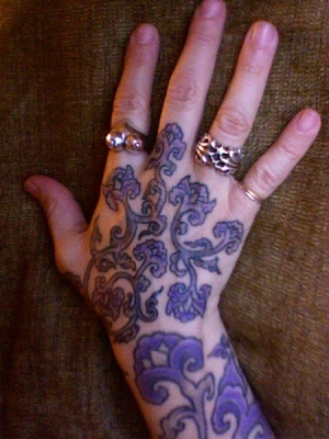 My right hand tattoo, with a mini version of the floral pattern on the same arm